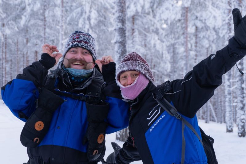 Snowshoers in the snow-white scenery